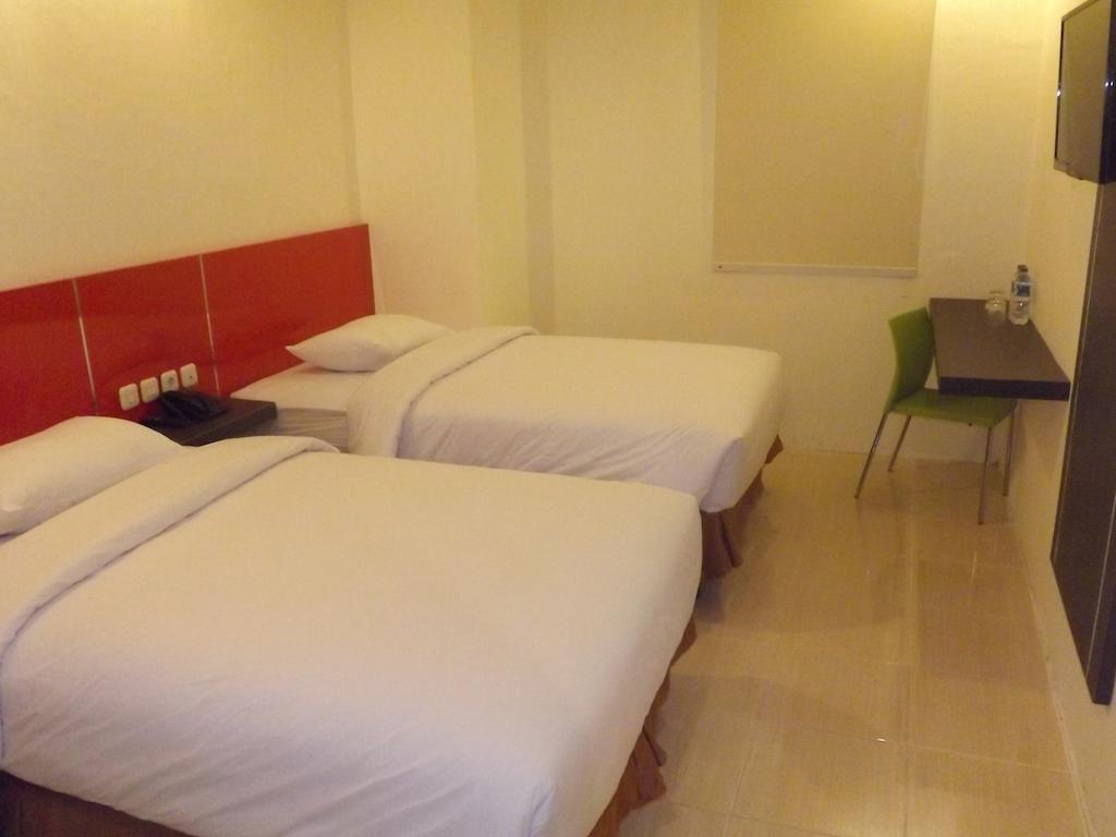 Quin Centro Hotel Palembang Bagian luar foto