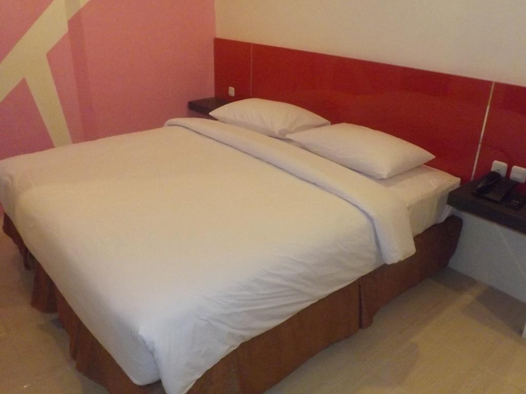 Quin Centro Hotel Palembang Bagian luar foto