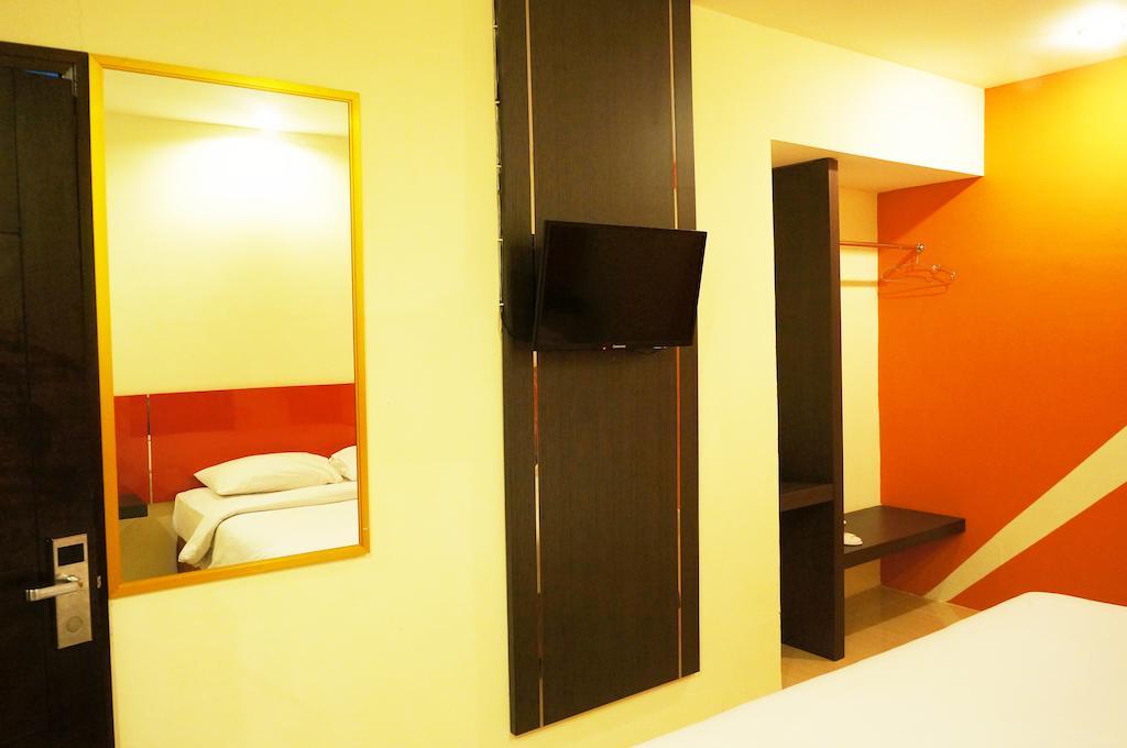 Quin Centro Hotel Palembang Ruang foto