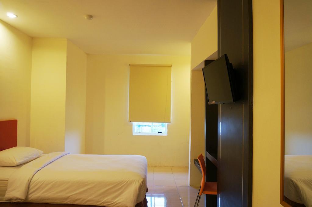 Quin Centro Hotel Palembang Bagian luar foto