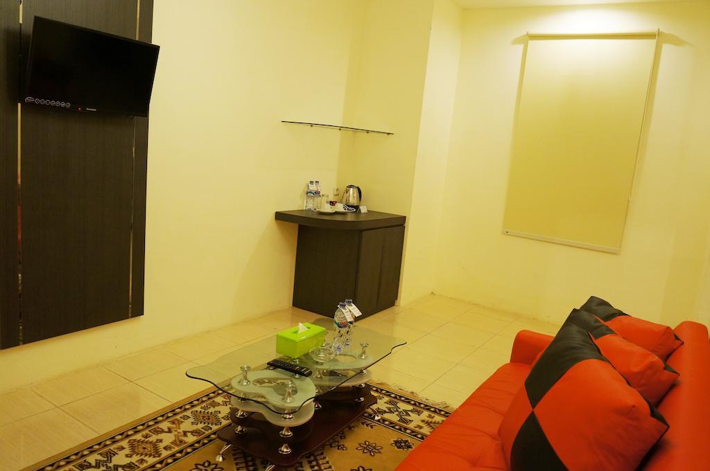 Quin Centro Hotel Palembang Ruang foto