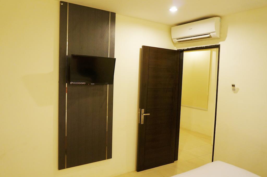 Quin Centro Hotel Palembang Ruang foto