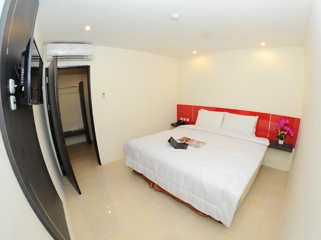 Quin Centro Hotel Palembang Bagian luar foto